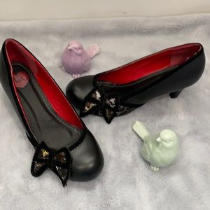 Black T.U.K. Heels with Bow.